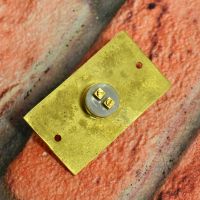 Back of solid brass bell push - terminals for wiring