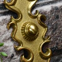 Close up of door bell push button