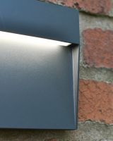 Close up of light detailing on garden wall light