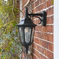 Bridlington Large Top Fix Black Wall Lantern in Situ on a Brick Wall