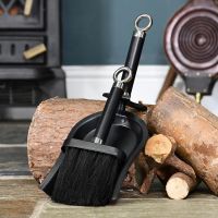 Bright Chrome and Black Iron Shovel and Brush in Situ