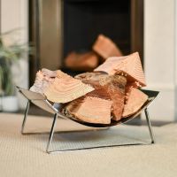 Bright Chrome Curved Contemporary Log Holder in Situ
