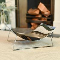 Bright Chrome Curved Contemporary Log Holder in situ by the Fireplace