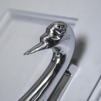 Close-Up of Bright Chrome Swan Head