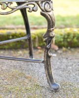 Close Up Of Butterfly Design Two Seater Bench Legs