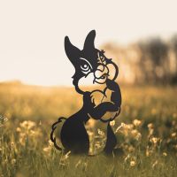Cartoon Rabbit Iron Silhouette in Situ in a Field