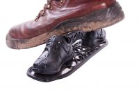 Black Shoe Design Boot Scraper in Use