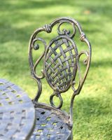 Close-Up of Ornate Pattern on Chair Backrest