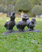 Cast Iron "Dynamic" Duck Family Trio Sculpture in Place in the Garden