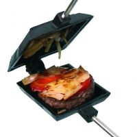 Cast Iron Cooking Press Being Used to cook a Burger
