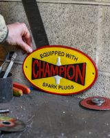 Scale image of "Champion" Cast Iron Automobilia Reproduction Sign 