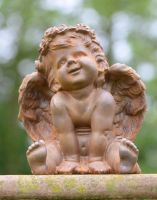 Cast Iron Smiling Cherub Garden Sculpture
