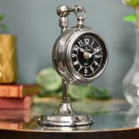 Beautiful bright chrome clock on table