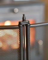 Close Up Of Classic Black Four Fold Fire Guard Detailing