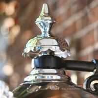 Close-up of the Top Fixing On The Bright Chrome Wall Lantern