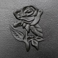 Close-up of the Black rose Motif on the Front of the Post Box