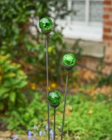 Close up of all 3 marbles on suncatcher garden ornament