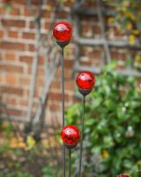 Close up of all 3 marbles on suncatcher garden ornament