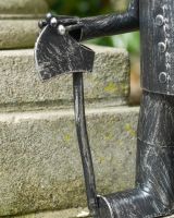 Close up of axe on Small Tin Man Garden Sculpture