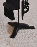 Close up of freestanding base on fireside companion set