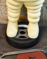 Close up on base of Michelin Man