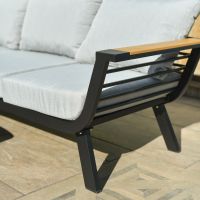 Close up of modern black metal frame on three seater sofa on garden lounge furniture set