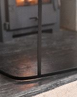 Close up of mesh and base detail on black fire guard