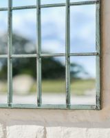 Close up of shabby chic garden mirror