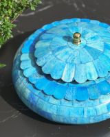 Close up of intricate scalloped detail on trinket bowl