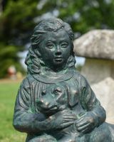 Close up of intricate face detail on garden statue