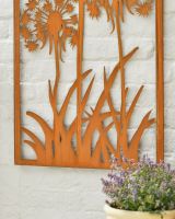 Close up of intricate cut out detail of grass on Rustic Dandelion Garden Wall Art