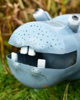 Close up of intricate face detail on recycled metal hippo sculptures