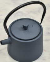 Close up of lid and handle detail on slate grey teapot