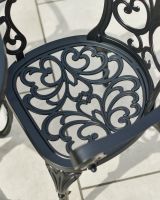 Close up of intricate seat detailing on patio two seater bistro set