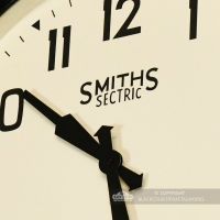 Close Up Of Smiths Wall Clock Cream Face