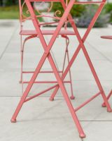 Close up of table leg detail on two seater patio table and chairs set