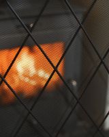 Close Up Of The Ornate Design On Tge Tree Fold Fire Screen