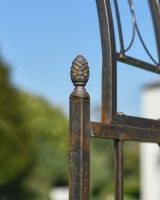 Close-up of the Acorns Design Finials on the Sides of the Rose Arch