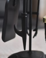 Close up of tools on fireside companion set
