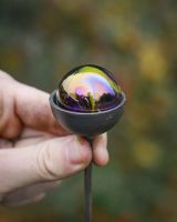 Close up scale image of suncatcher plant pot spike