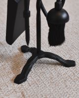 Close up of freestanding base and tools on fireside companion set