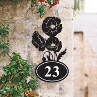 Cluster of Poppies Iron House Number Sign in Situ on a House
