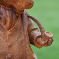 Close up of Rustic Cast Iron Hare with Pipe 