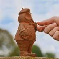 Side view of Small Rustic Cast Iron Owl Sculpture 