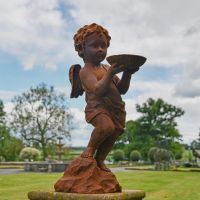 Rustic Cast Iron Winged Cherub with Bird Bath Sculpture in Garden 