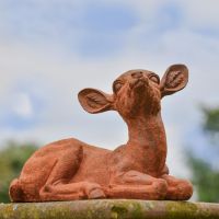 Rustic Cast Iron Sitting Deer Sculpture - Facing Right