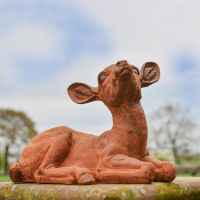 Rustic Cast Iron Sitting Deer Sculpture - Facing Right in Situ