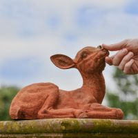 Rustic Cast Iron Sitting Deer Sculpture - Facing Right to Scale
