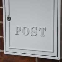 Close up of Hand Painted White Lettering 
