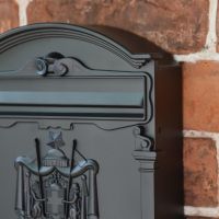 Close up of Motif on Midnight Thunder Post Box 